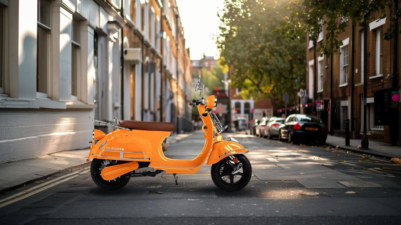One Moto Electa Electric Motorcycle, Busted Orange Colour, On a street in London